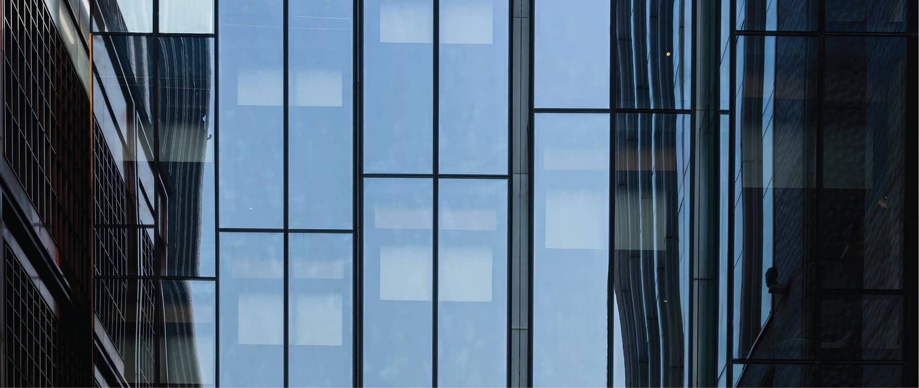 Glass facade of modern skyscrapers