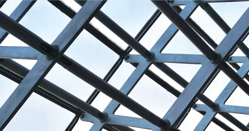 Steel lattice structure against a clear sky